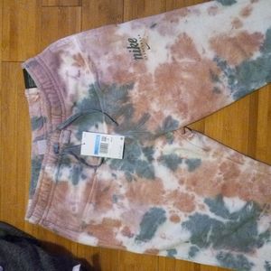 Nike sweatpants standard fit taperd leg size medium tie-dye